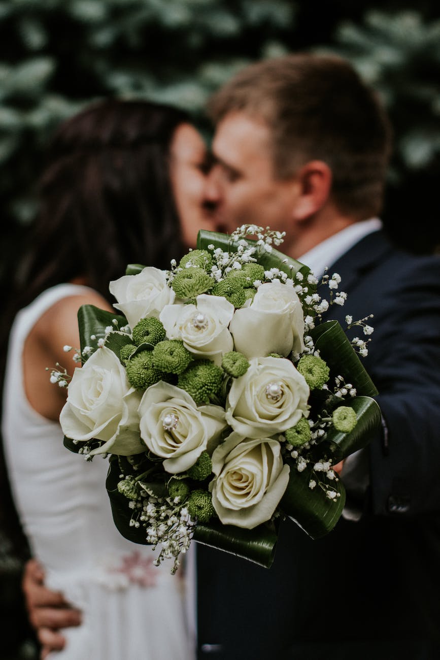 man and woman kissing